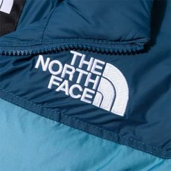 The North Face WOMEN'S 1996 RETRO NUPTSE JACKET -NIke Shop TheNorthFace1996RETRONUPTSEJACKETSTORMBLUEMONTEREYBLUEYELLOWMNF0A3XEO9NQ 4