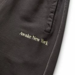 Awake NY PIGMENT DYED EMBROIDERED SWEATPANTS -NIke Shop awakenyPIGMENTDYEDEMBROIDEREDSWEATPANTBLACKSAWK FW22 PA005 3