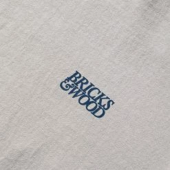 Bricks & Wood A SOUTH CENTRAL COMPANY LOGO T-SHIRT 9 Bricks & Wood A SOUTH CENTRAL COMPANY LOGO T-SHIRT -NIke Shop bricks woodsASOUTHCENTRALCOMPANYLOGOTEESILVERSBW FW22 SSCTEES 3